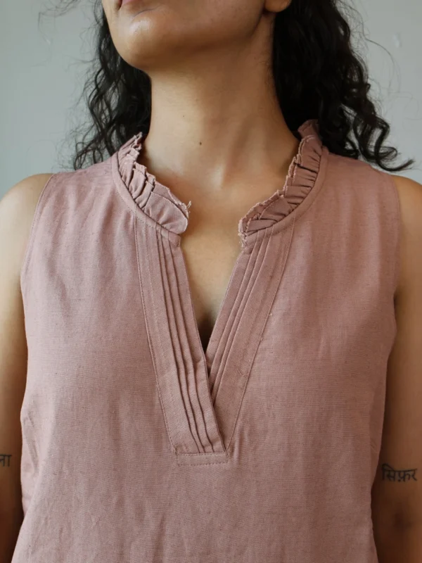 Mocha Ruffled Shift Dress with Pockets | Pocket Dress Woman wearing dusty mocha sleeveless shift dress with ruffled V-neckline and invisible side pockets, Pocket Dress India