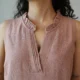 Mocha Ruffled Shift Dress with Pockets | Pocket Dress Woman wearing dusty mocha sleeveless shift dress with ruffled V-neckline and invisible side pockets, Pocket Dress India