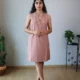 Mocha Ruffled Shift Dress with Pockets | Pocket Dress Woman wearing dusty mocha sleeveless shift dress with ruffled V-neckline and invisible side pockets, Pocket Dress India