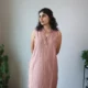 Mocha Ruffled Shift Dress with Pockets | Pocket Dress Woman wearing dusty mocha sleeveless shift dress with ruffled V-neckline and invisible side pockets, Pocket Dress India
