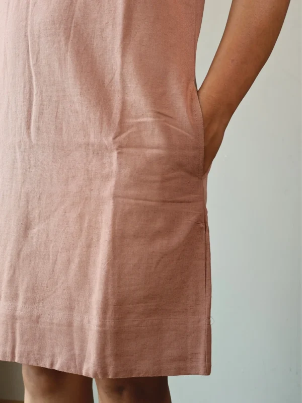 Mocha Ruffled Shift Dress with Pockets | Pocket Dress Woman wearing dusty mocha sleeveless shift dress with ruffled V-neckline and invisible side pockets, Pocket Dress India
