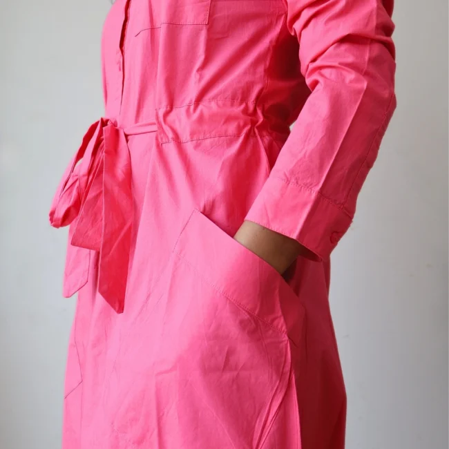 Woman wearing hot pink button-down shirt dress with waist tie and invisible side pockets, Pocket Dress India