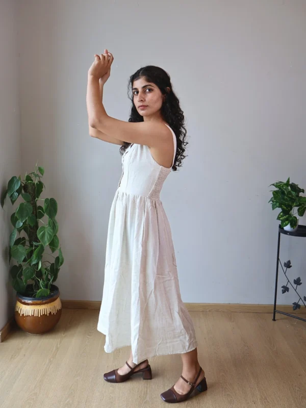 Ivory V-Neck Midi Dress with Pockets | Pocket Dress Woman wearing ivory V-neck midi dress with button accents and invisible side pockets, Pocket Dress India