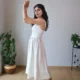 Ivory V-Neck Midi Dress with Pockets | Pocket Dress Woman wearing ivory V-neck midi dress with button accents and invisible side pockets, Pocket Dress India