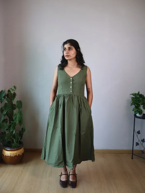 Olive V-Neck Midi Dress with Pockets | Pocket Dress Woman wearing olive green sleeveless V-neck midi dress with invisible side pockets, Pocket Dress India
