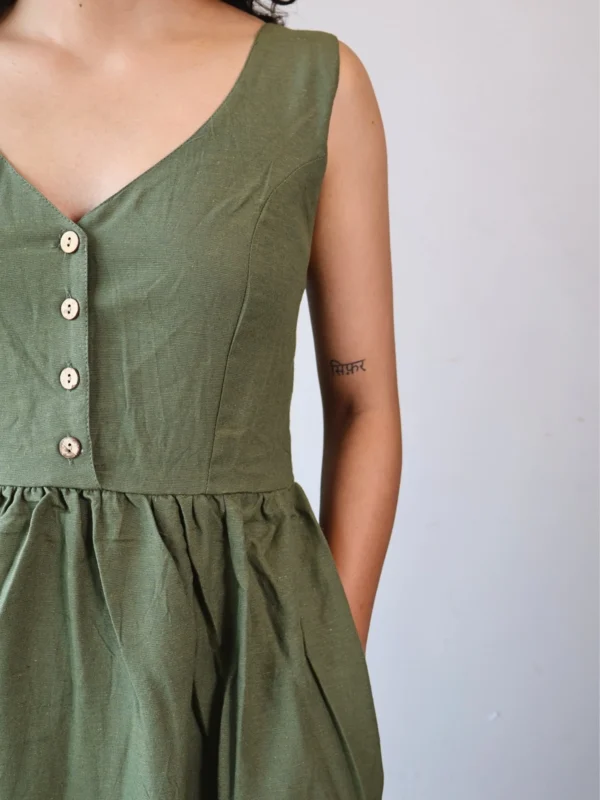Olive V-Neck Midi Dress with Pockets | Pocket Dress Woman wearing olive green sleeveless V-neck midi dress with invisible side pockets, Pocket Dress India