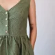 Olive V-Neck Midi Dress with Pockets | Pocket Dress Woman wearing olive green sleeveless V-neck midi dress with invisible side pockets, Pocket Dress India