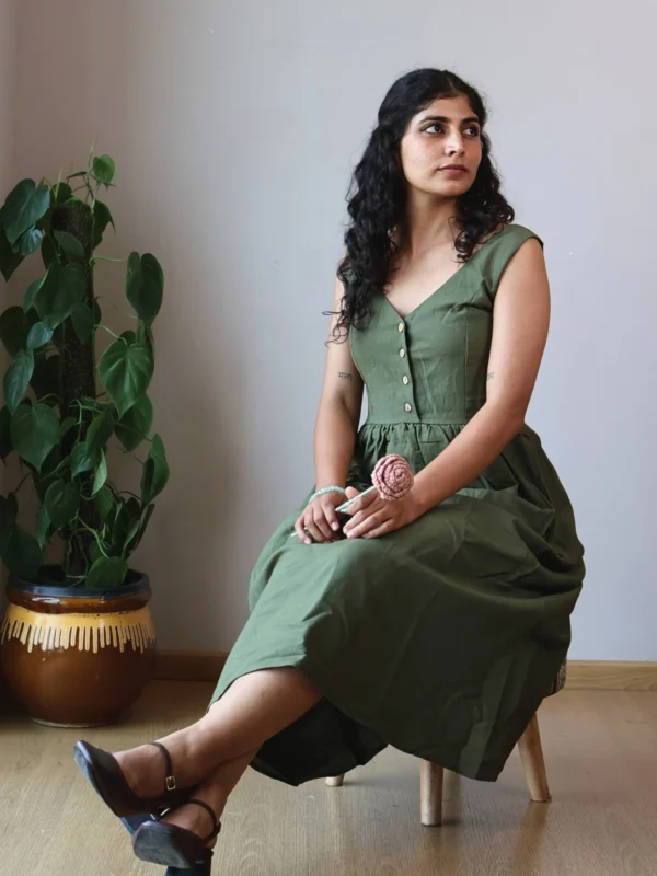 Olive V-Neck Midi Dress with Pockets | Pocket Dress Woman wearing olive green sleeveless V-neck midi dress with invisible side pockets, Pocket Dress India