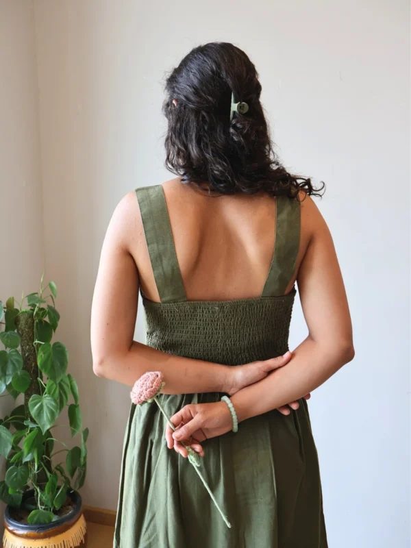 Olive V-Neck Midi Dress with Pockets | Pocket Dress Woman wearing olive green sleeveless V-neck midi dress with invisible side pockets, Pocket Dress India