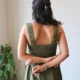 Olive V-Neck Midi Dress with Pockets | Pocket Dress Woman wearing olive green sleeveless V-neck midi dress with invisible side pockets, Pocket Dress India