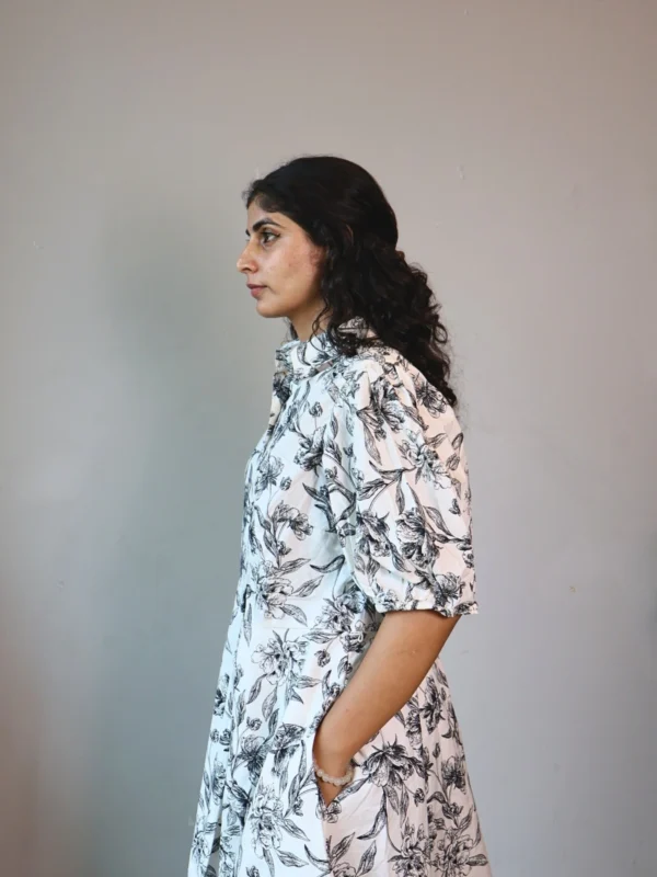 Black & White Floral Puff Sleeve Shirt Dress | Pocket Dress Woman wearing black and white botanical print shirt dress with puff sleeves and invisible side pockets, Pocket Dress India