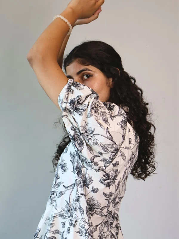 Black & White Floral Puff Sleeve Shirt Dress | Pocket Dress Woman wearing black and white botanical print shirt dress with puff sleeves and invisible side pockets, Pocket Dress India