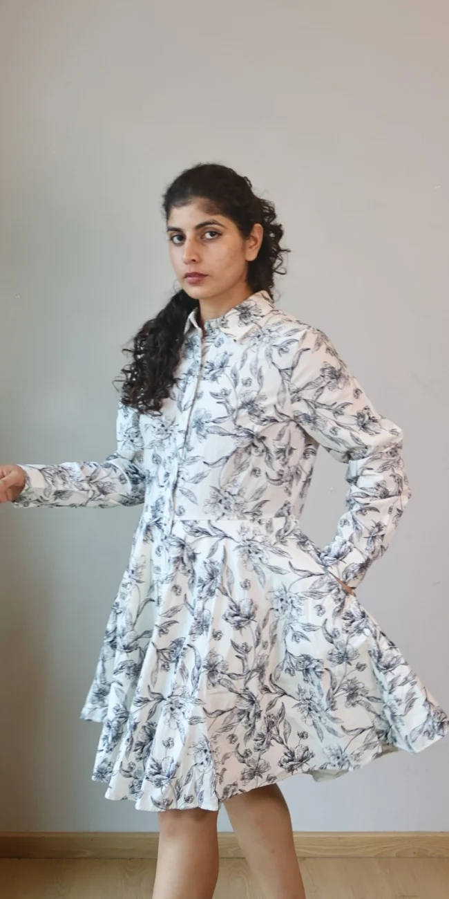 Woman wearing black and white botanical sketch print shirt dress with invisible side pockets, Pocket Dress India