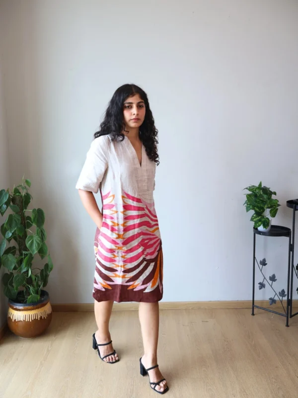 Beige Linen Botanical Print Dress with Pockets | Pocket Dress Woman wearing beige linen dress with bold pink, orange, and maroon botanical print and invisible side pockets, Pocket Dress India