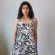 Monochrome Abstract Print Mini Dress with Pockets | Pocket Dress Woman wearing black and off-white geometric abstract print A-line mini dress with invisible side pockets, Pocket Dress India