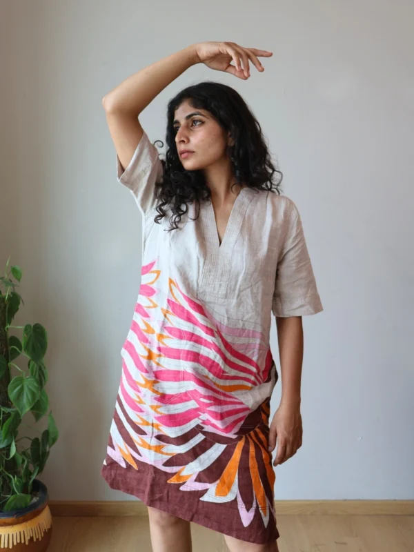 Beige Linen Botanical Print Dress with Pockets | Pocket Dress Woman wearing beige linen dress with bold pink, orange, and maroon botanical print and invisible side pockets, Pocket Dress India