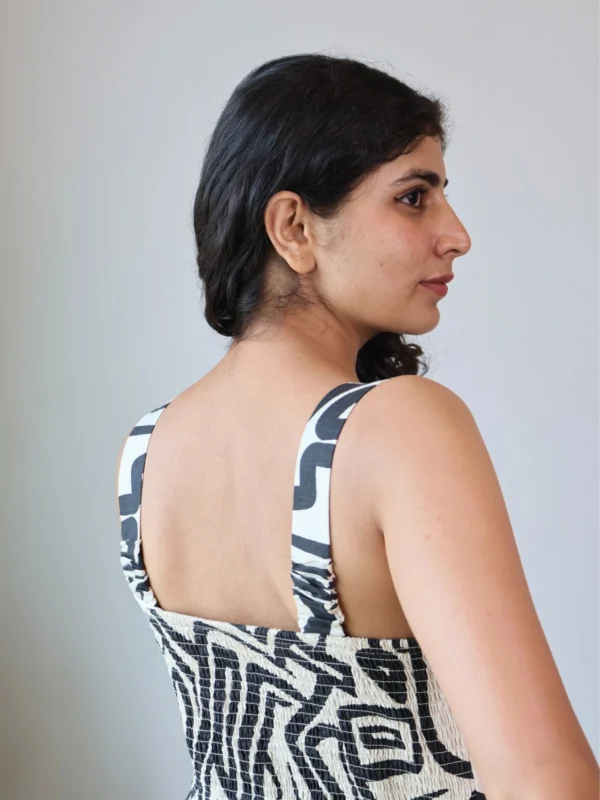 Monochrome Abstract Print Mini Dress with Pockets | Pocket Dress Woman wearing black and off-white geometric abstract print A-line mini dress with invisible side pockets, Pocket Dress India