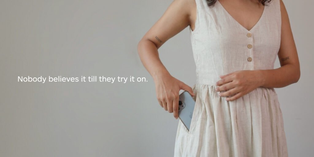 Cream Pocket Dress with a functional pocket holding a phone, no bag needed